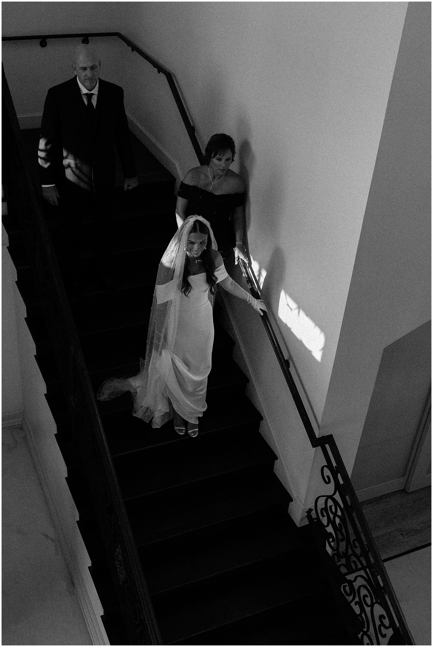 bride walking down the stairs of knotting hill wedding venue