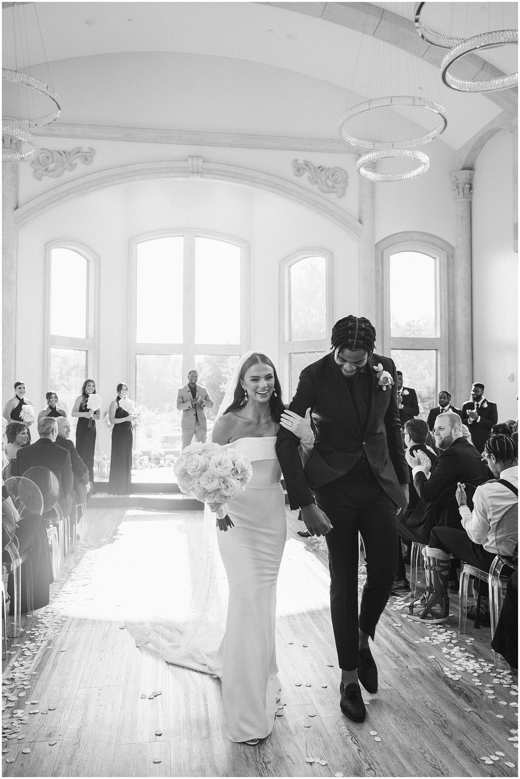 joyful candid moment of bride and groom after ceremony