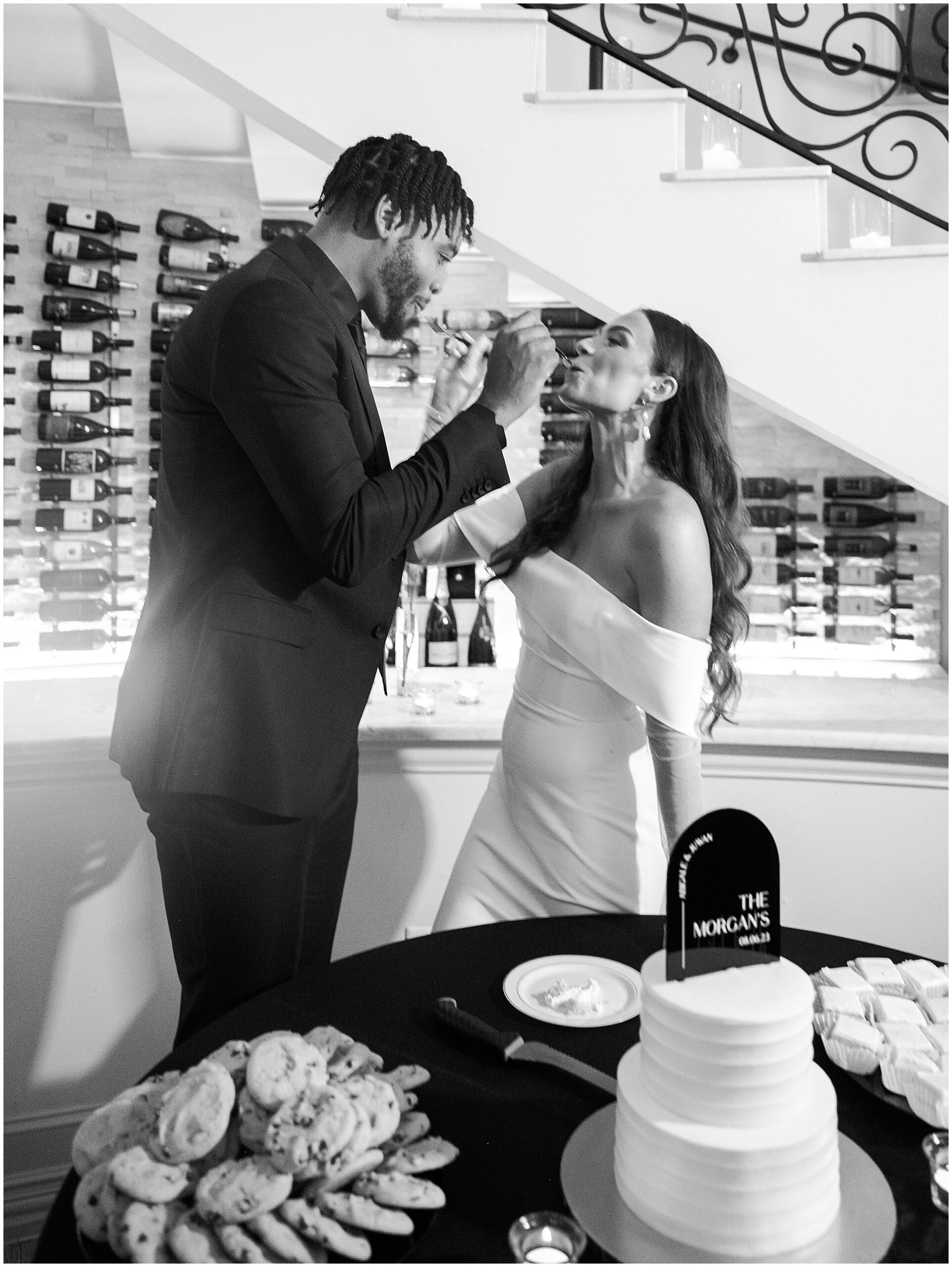 bride and groom cut cake at knotting hill