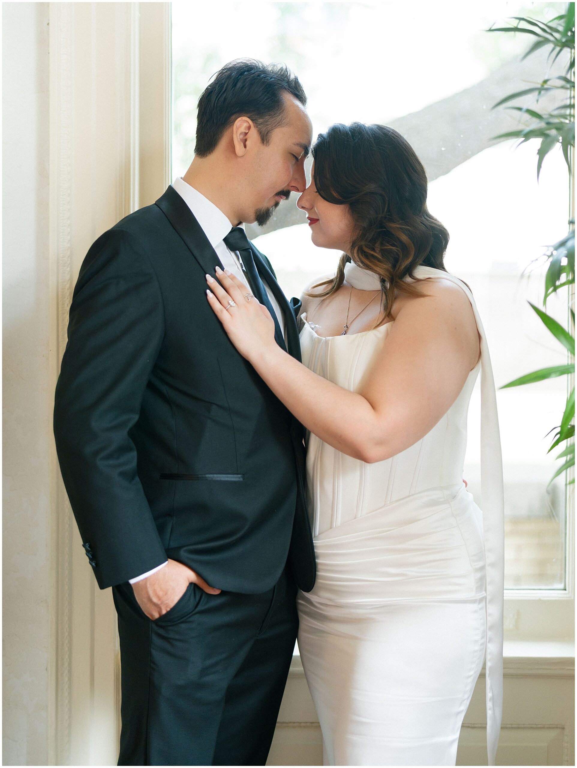 bride and groom in the parlor at the alexander mansion