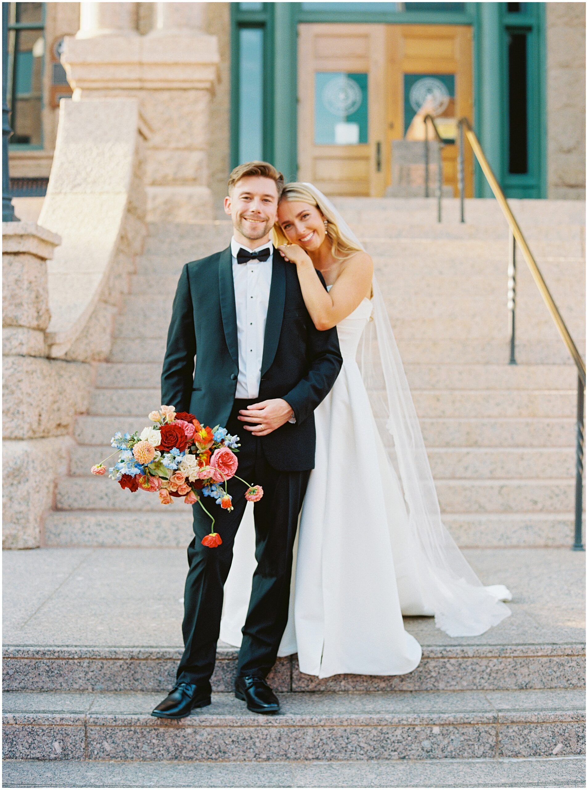 bride and groom portraits at the fort worth courthouse steps