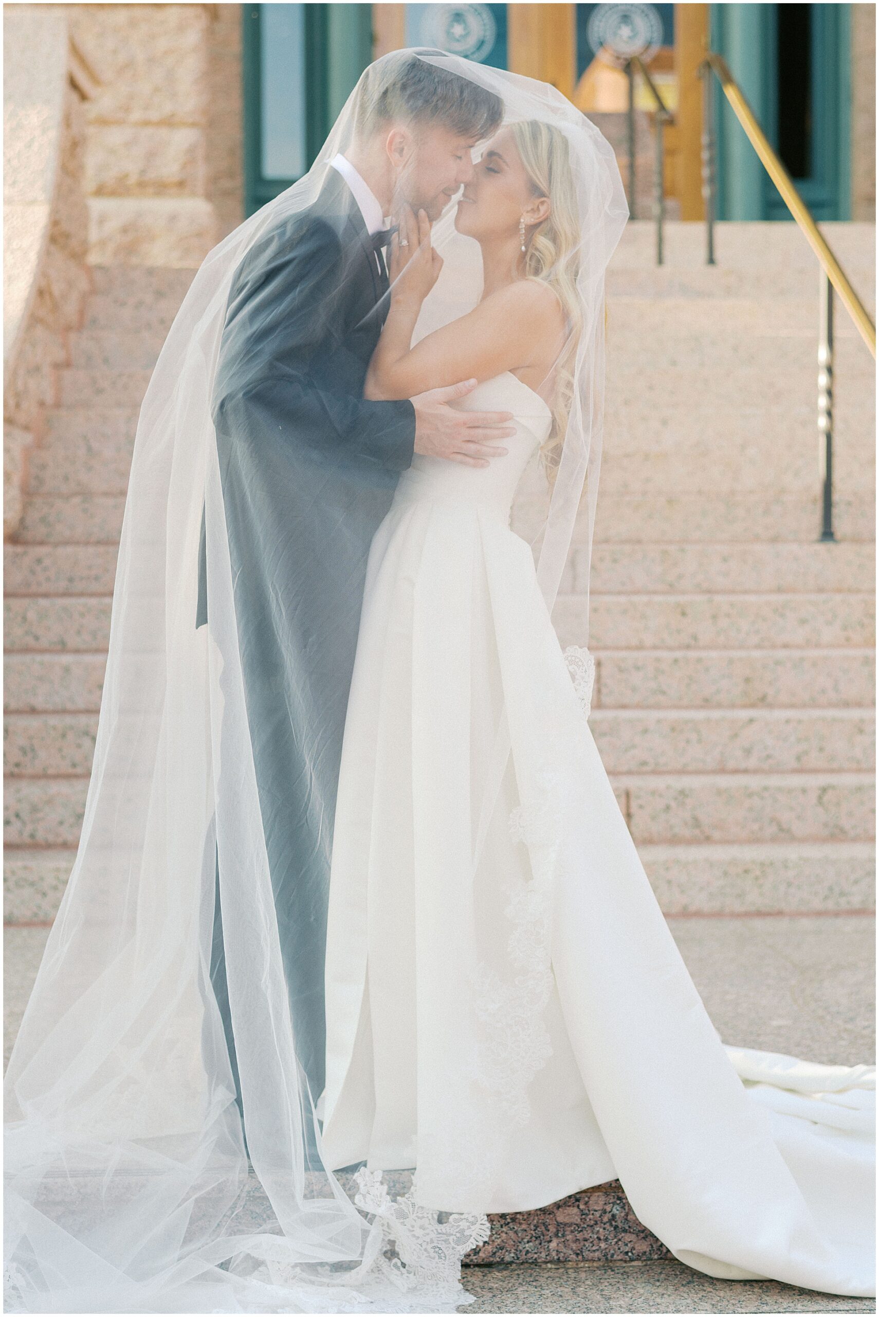 bride and groom portraits at the fort worth courthouse steps