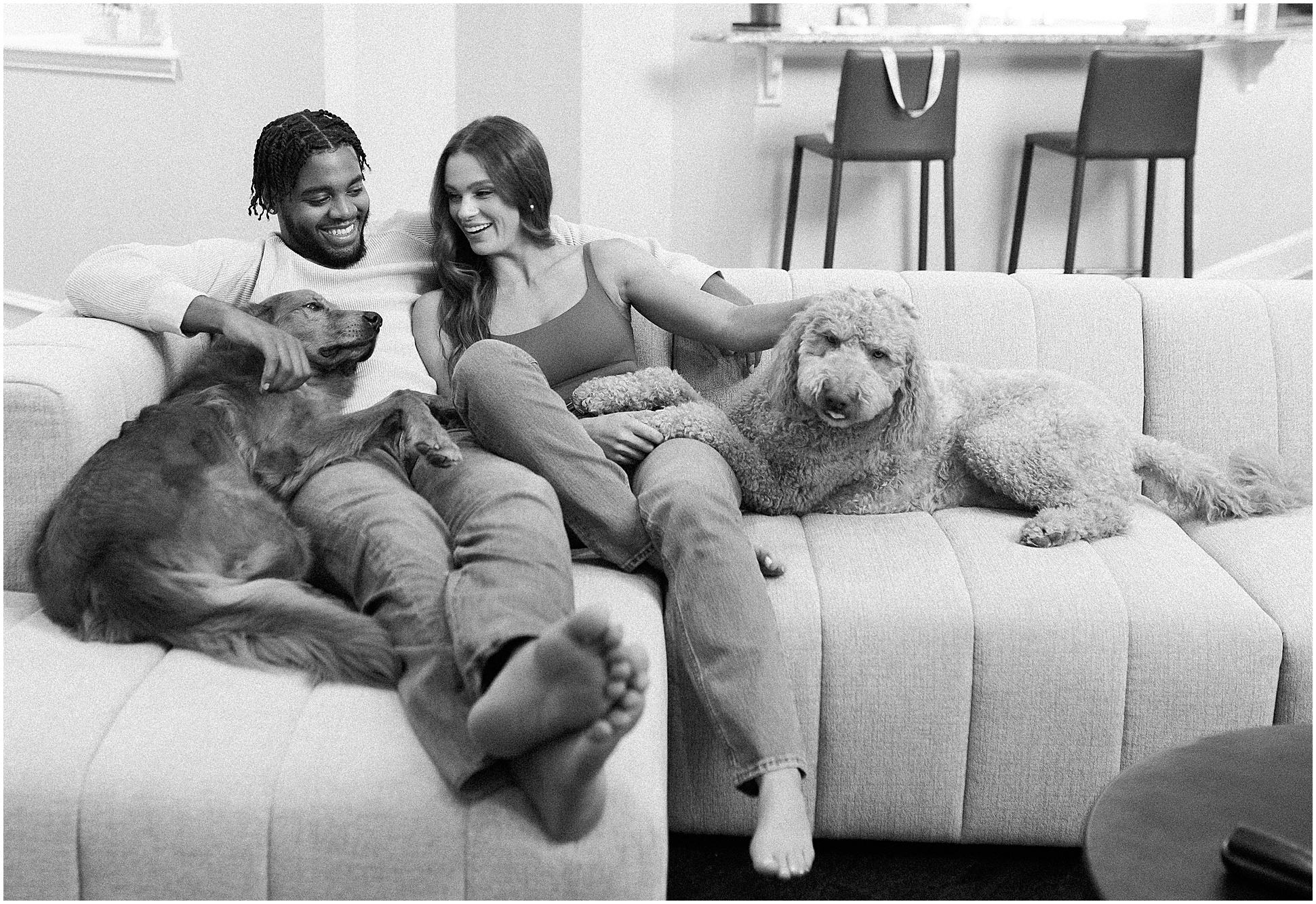 In-home engagement session with couple and their furry friends