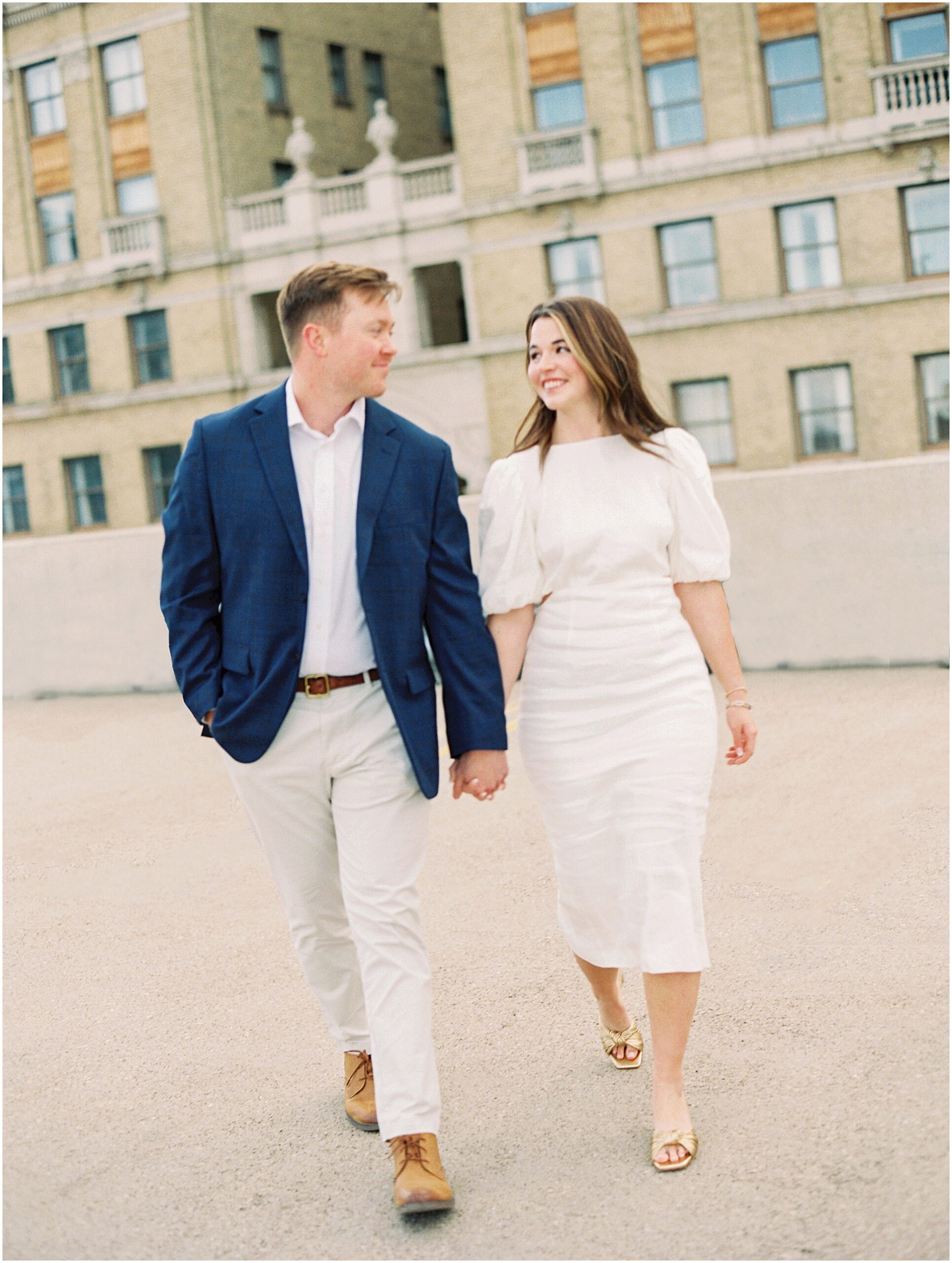Urban Romance: Catherine and Jack Embrace Against Downtown Dallas Backdrop