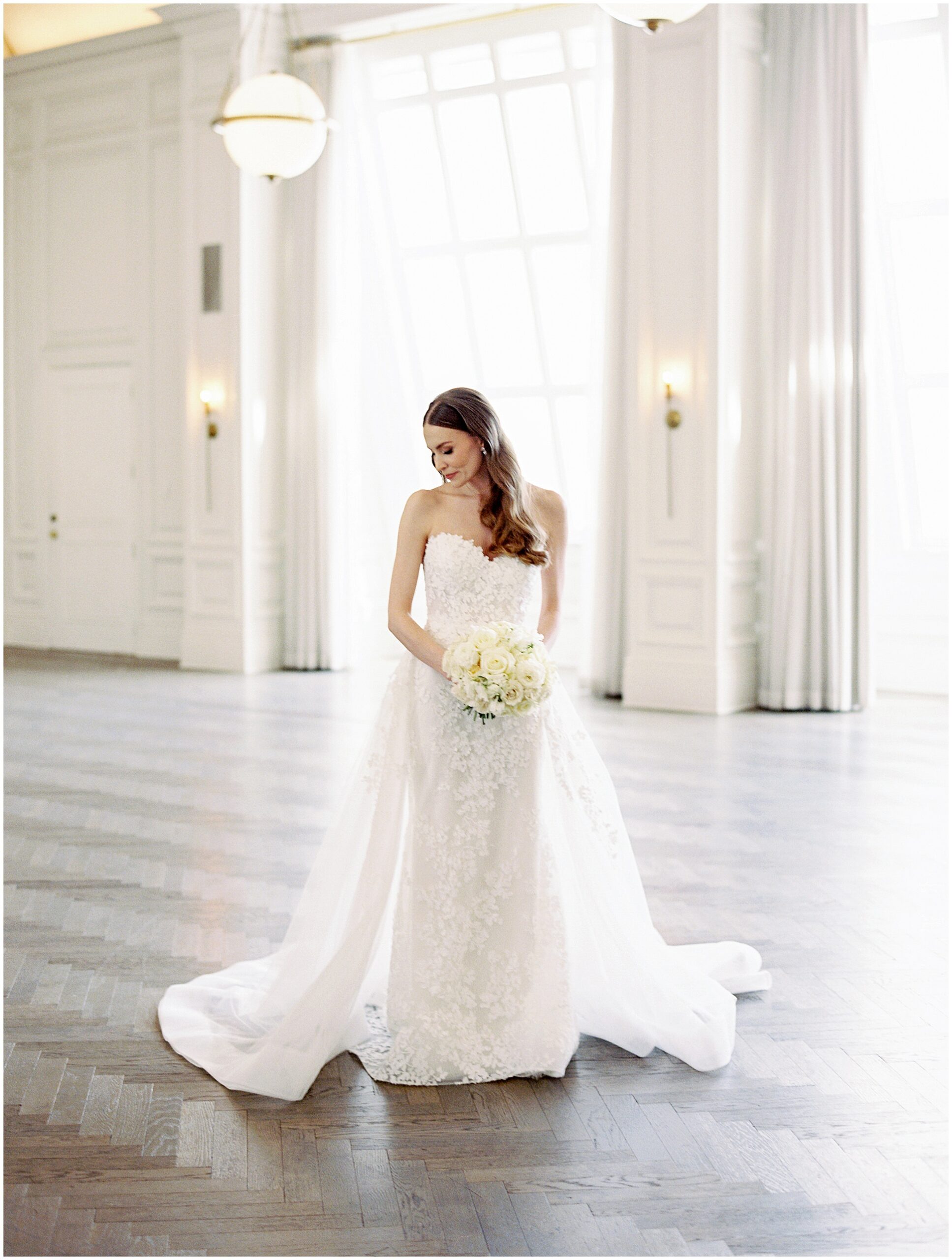 Film photo of bride walking at Adolphus hotel